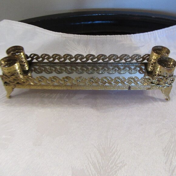 This is a vintage vanity tray with a mirror and lipstick holders. - Picture 12 of 13
